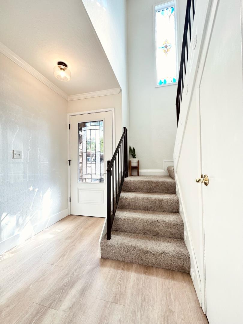 113 Madeline Drive, Unit 3 Aptos, CA 95003 - Photo 8 of 19 a view of entryway and hall with wooden floor