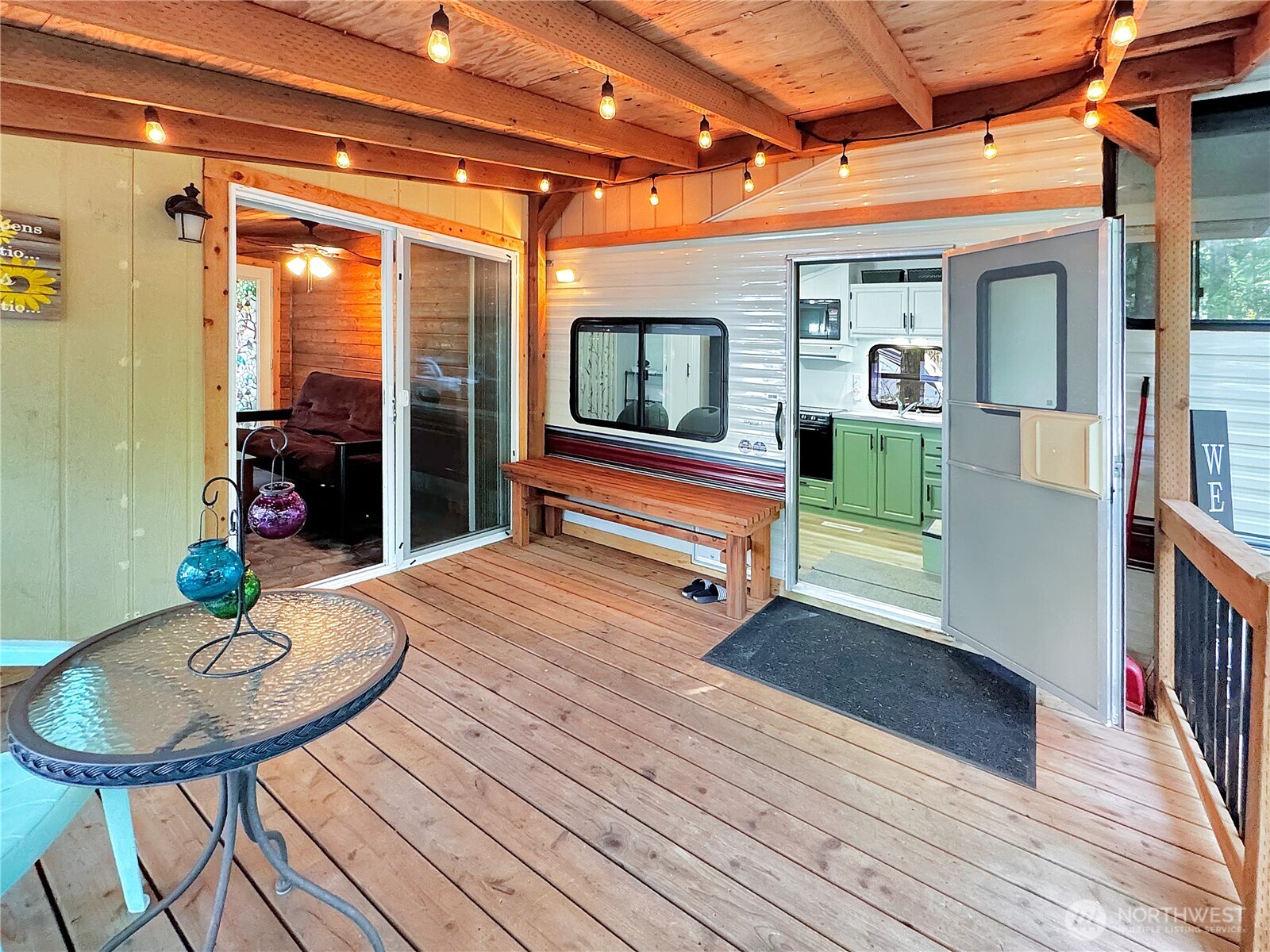 203-1 Fireside Lodge Deming, WA 98244 - Photo 4 of 26 a backyard of a house with table and chairs