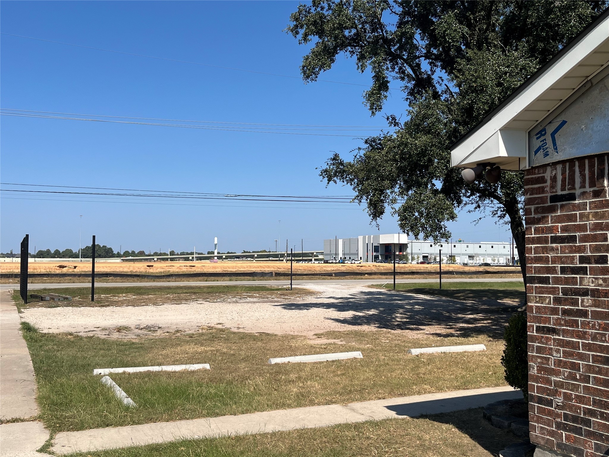 13927 Boudreaux Road Tomball, TX 77377 - Photo 3 of 6 a view of a swimming pool with an outdoor seating