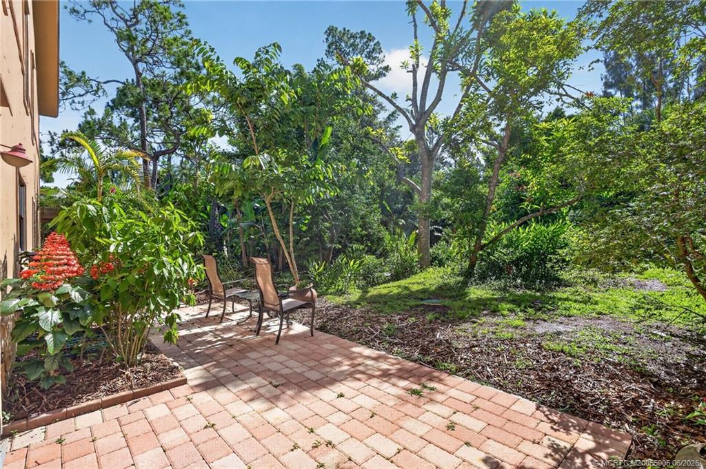 11145 Southwest Meadowlark Circle Stuart, FL 34997 - Photo 10 of 107 Newer paver walkway
