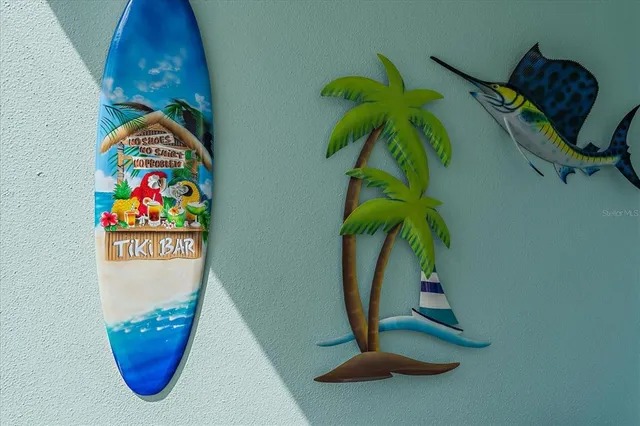 a view of a balcony dining area with furniture