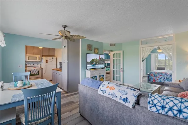 a living room with furniture and a table