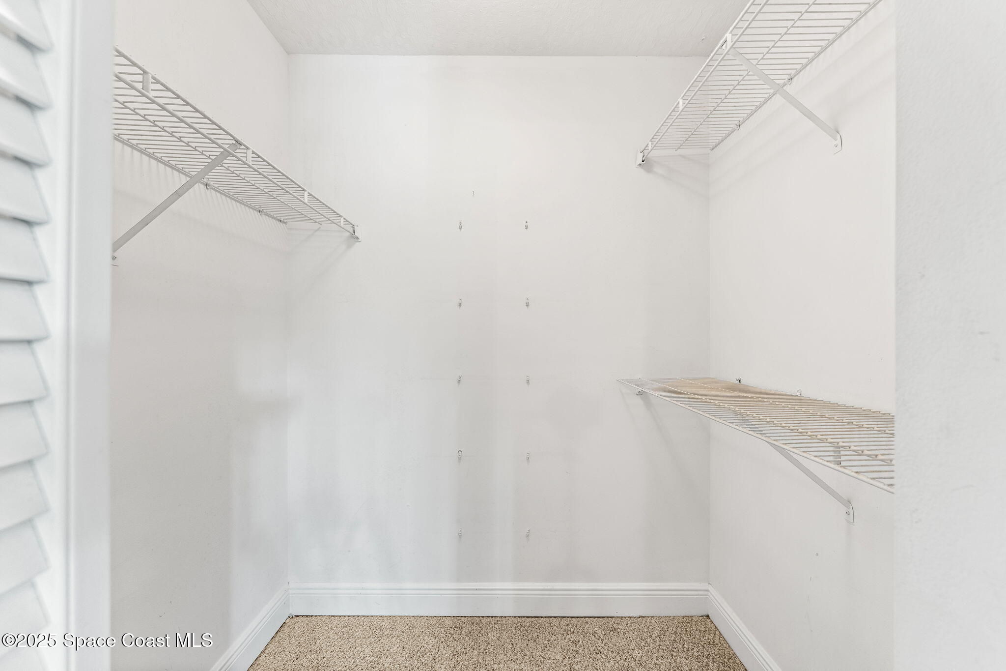 7667 North Wickham Road, Unit 712 Melbourne, FL 32940 - Photo 26 of 52 Walk-in Closet