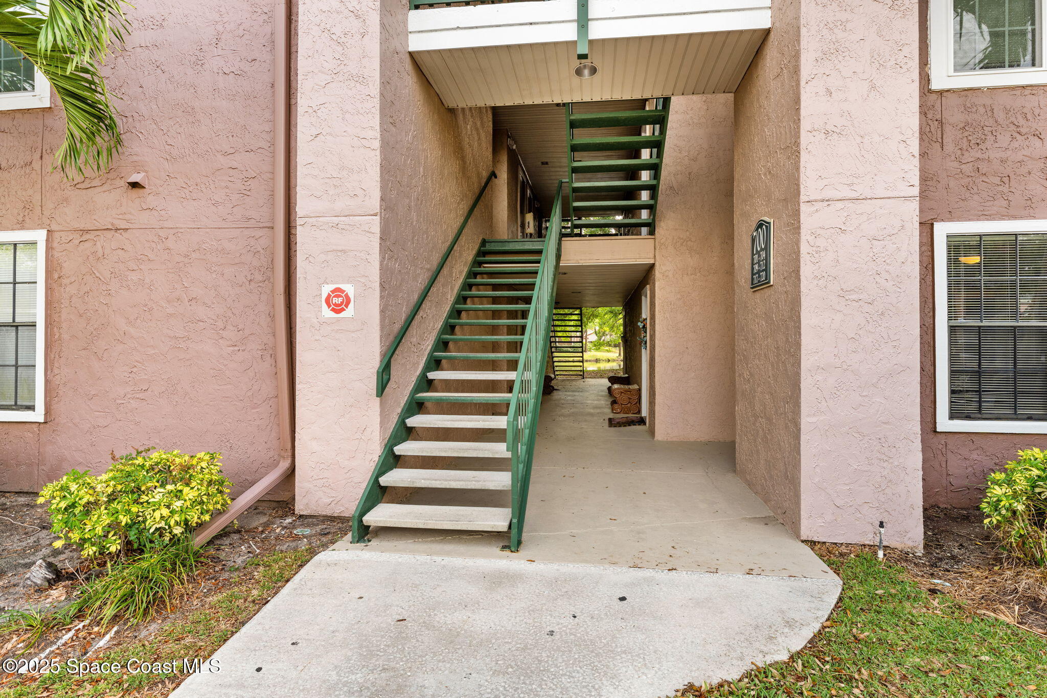 7667 North Wickham Road, Unit 712 Melbourne, FL 32940 - Photo 7 of 52 Front Stairwell