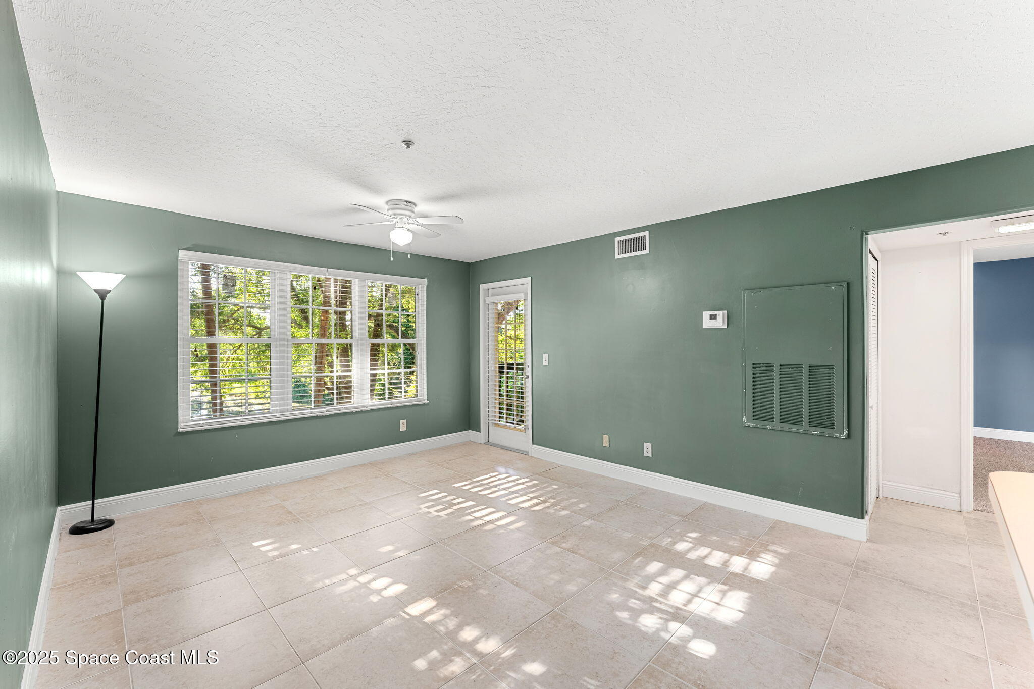 7667 North Wickham Road, Unit 712 Melbourne, FL 32940 - Photo 10 of 52 Living Room