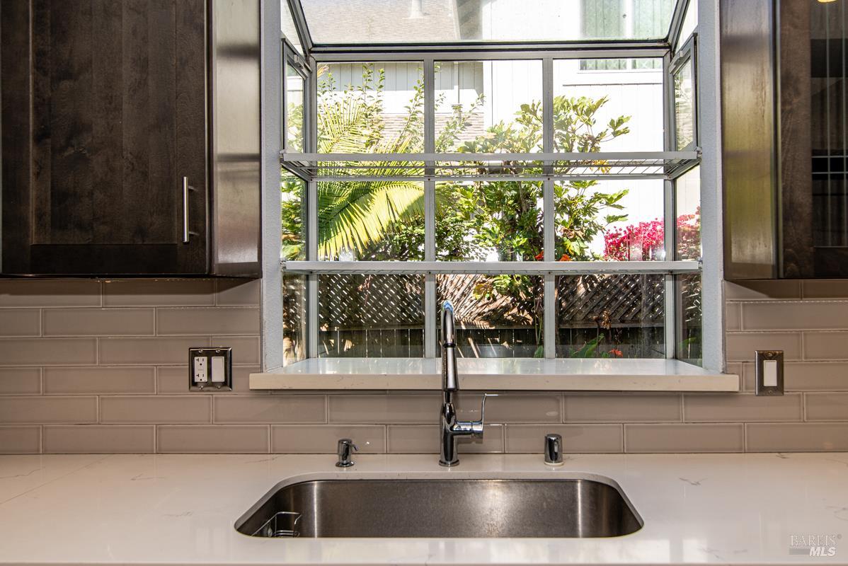 23 Baypoint Drive San Rafael, CA 94901 - Photo 12 of 40 a kitchen with a sink and a large window