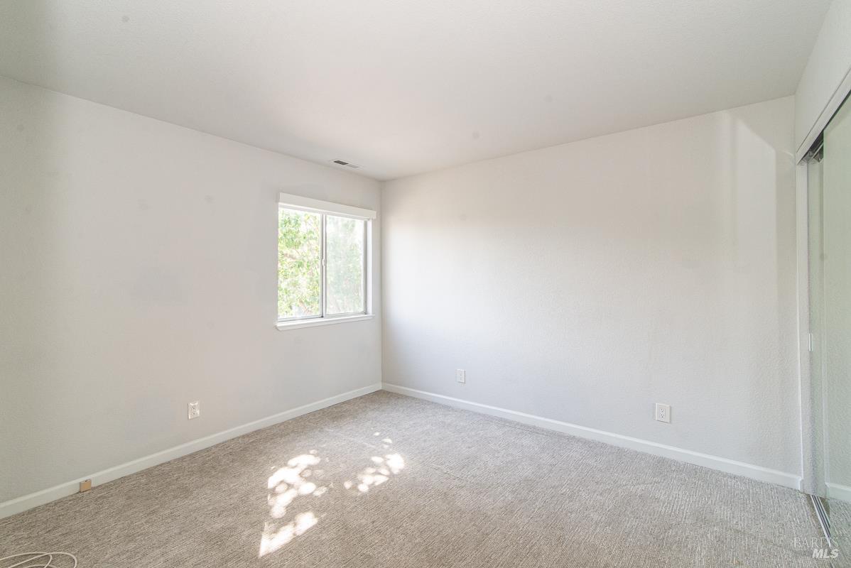 23 Baypoint Drive San Rafael, CA 94901 - Photo 33 of 40 a view of an empty room with a window