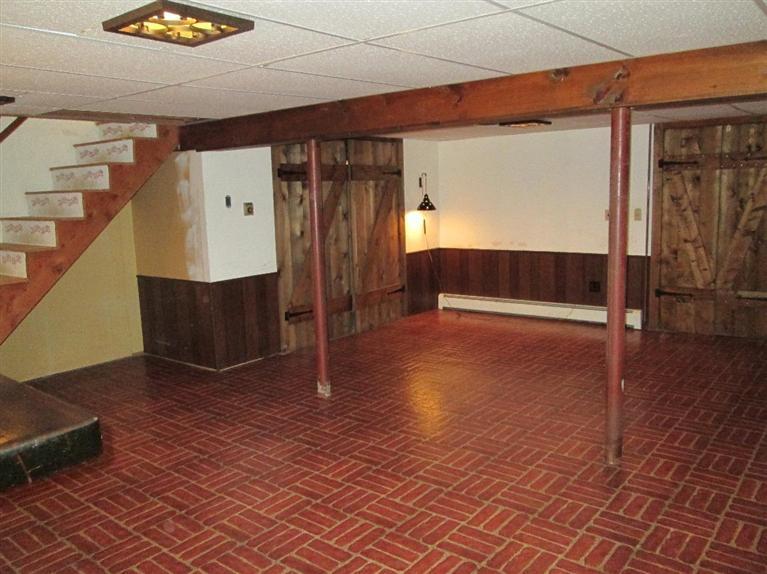 28 Eel Pond Road Monument Beach, MA 02532 - Photo 16 of 29 a view of an empty room with wooden floor