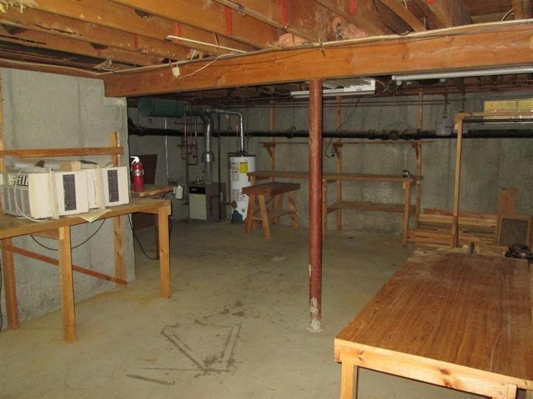 28 Eel Pond Road Monument Beach, MA 02532 - Photo 17 of 29 a view of a room with racks