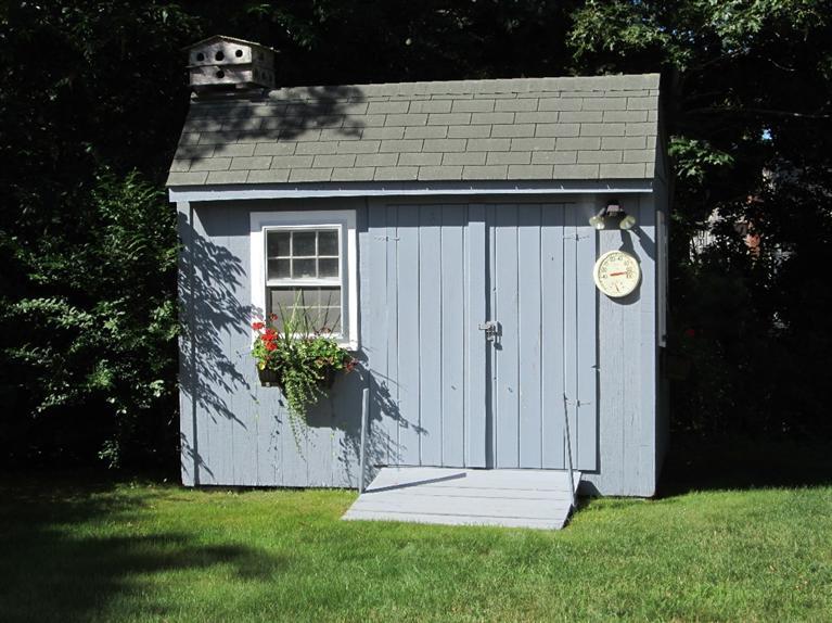 28 Eel Pond Road Monument Beach, MA 02532 - Photo 22 of 29 a view of a house with backyard and garden