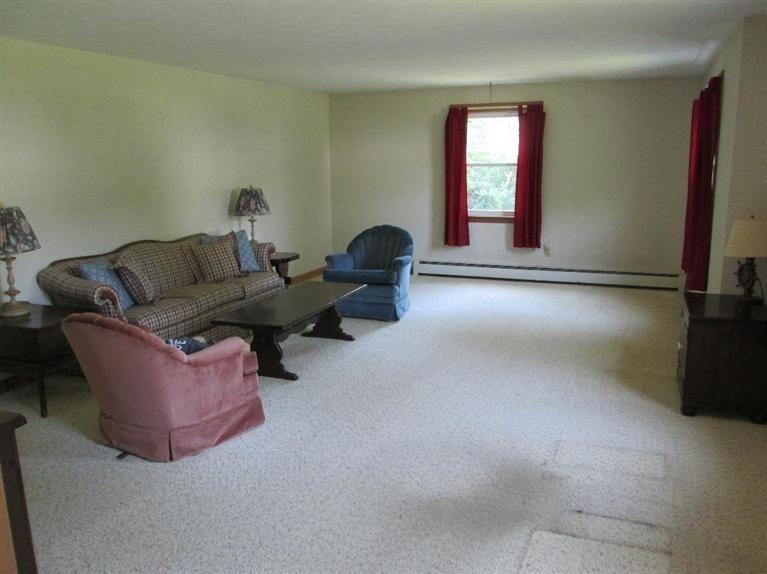28 Eel Pond Road Monument Beach, MA 02532 - Photo 5 of 29 a living room with furniture and a window