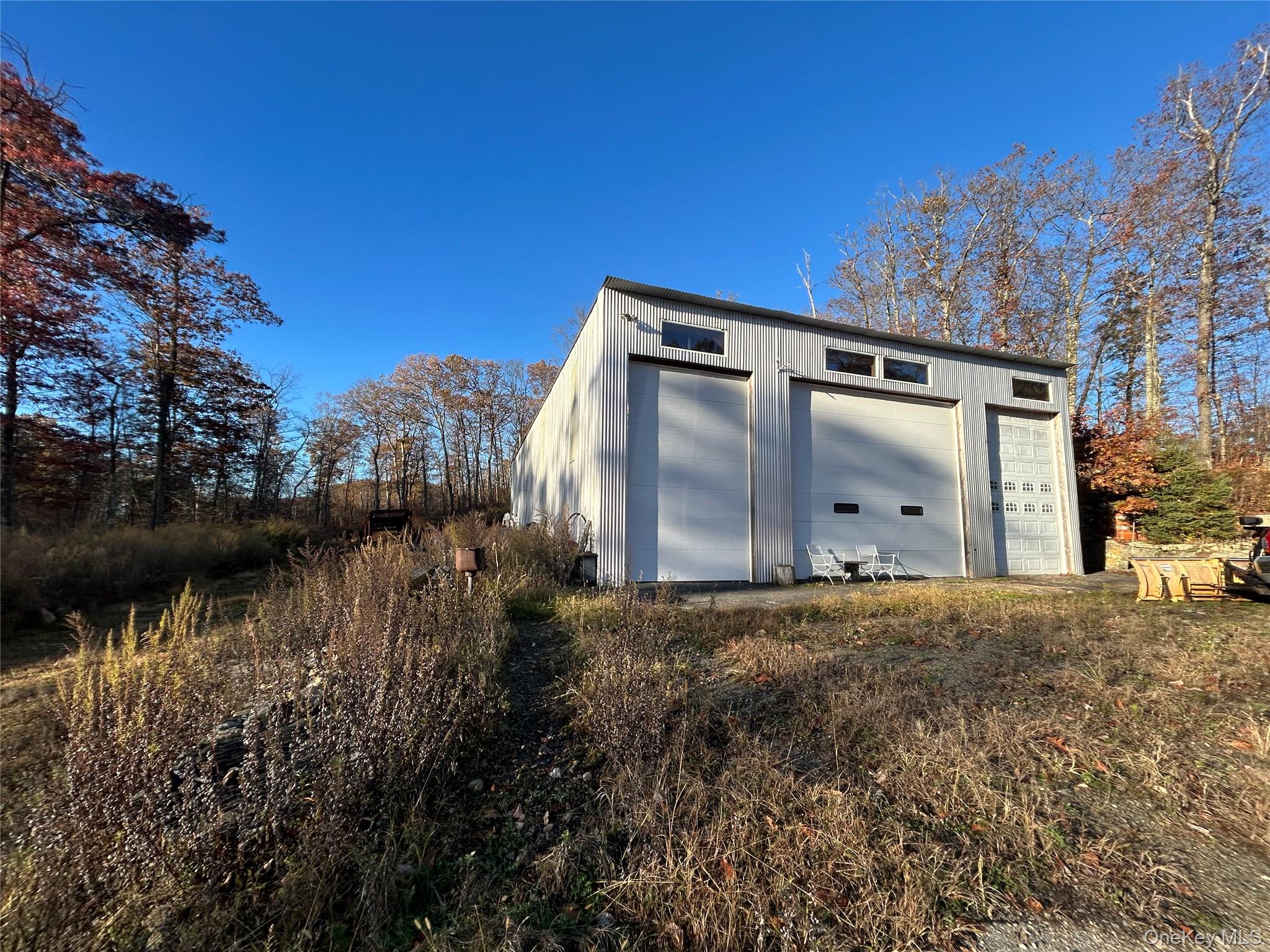 545 Grape Hollow Road Holmes, NY 12531 - Photo 3 of 15 a view of a house with a yard