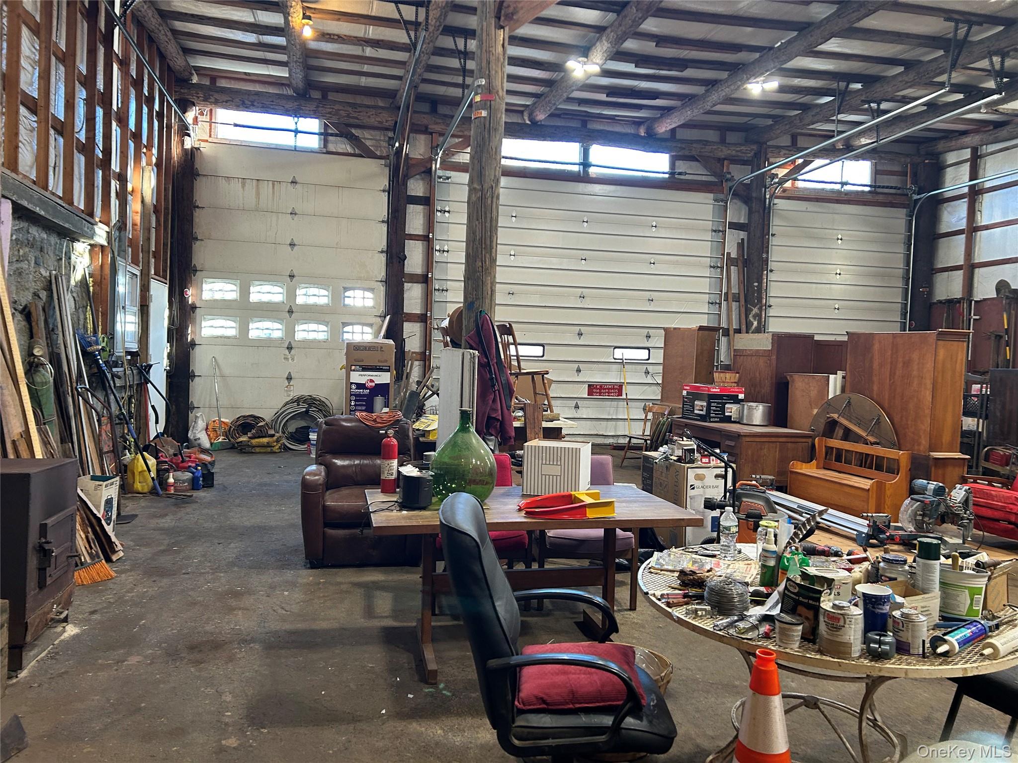 545 Grape Hollow Road Holmes, NY 12531 - Photo 8 of 15 a outdoor space with lots of furniture and cars