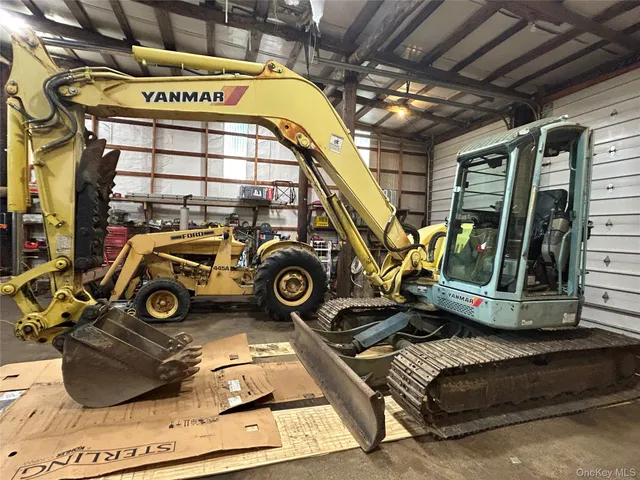 a view of front door and yard