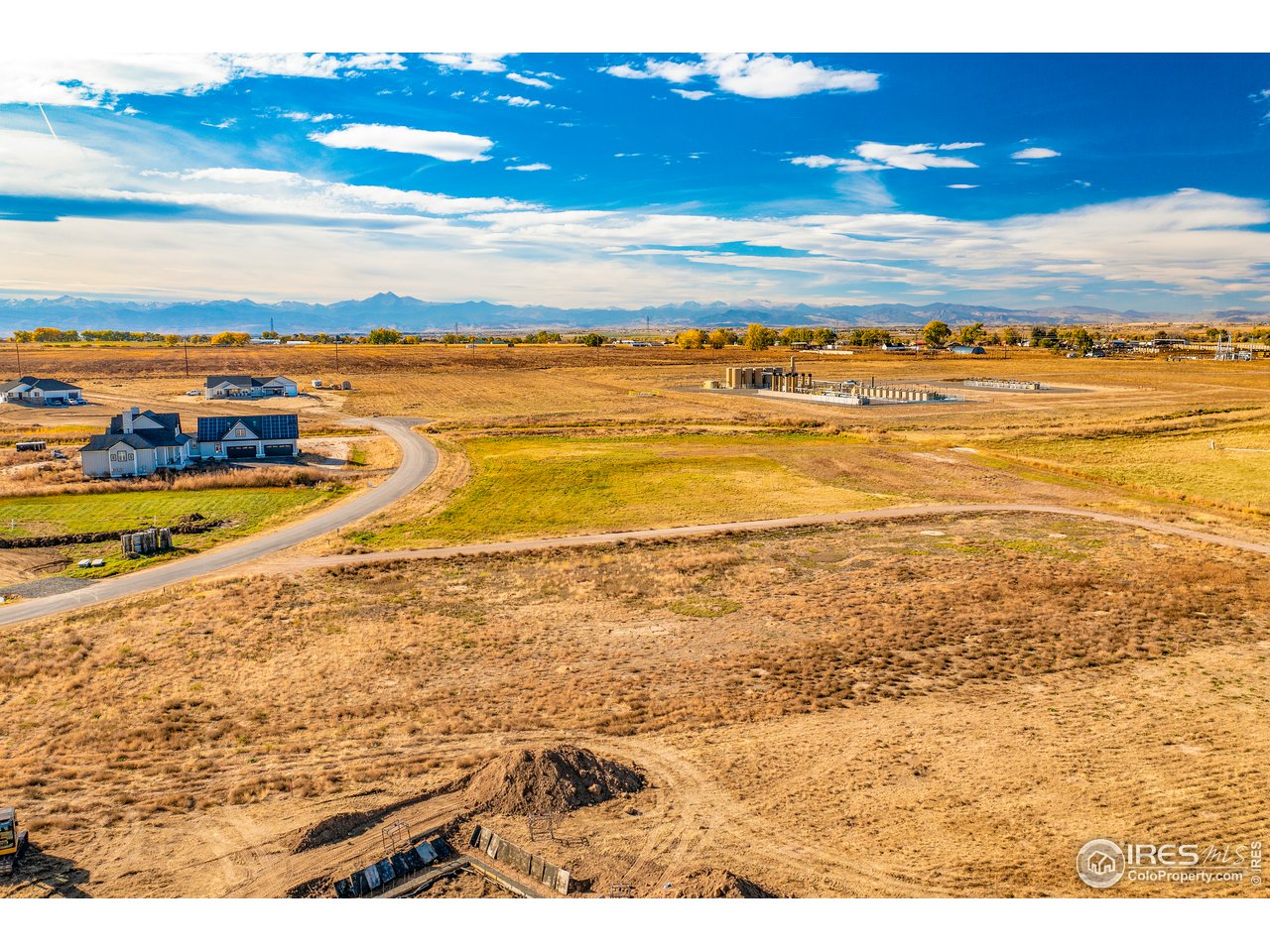 11618 Harpenden Lane Fort Lupton, CO 80621 - Photo 4 of 10 a view of an ocean and beach