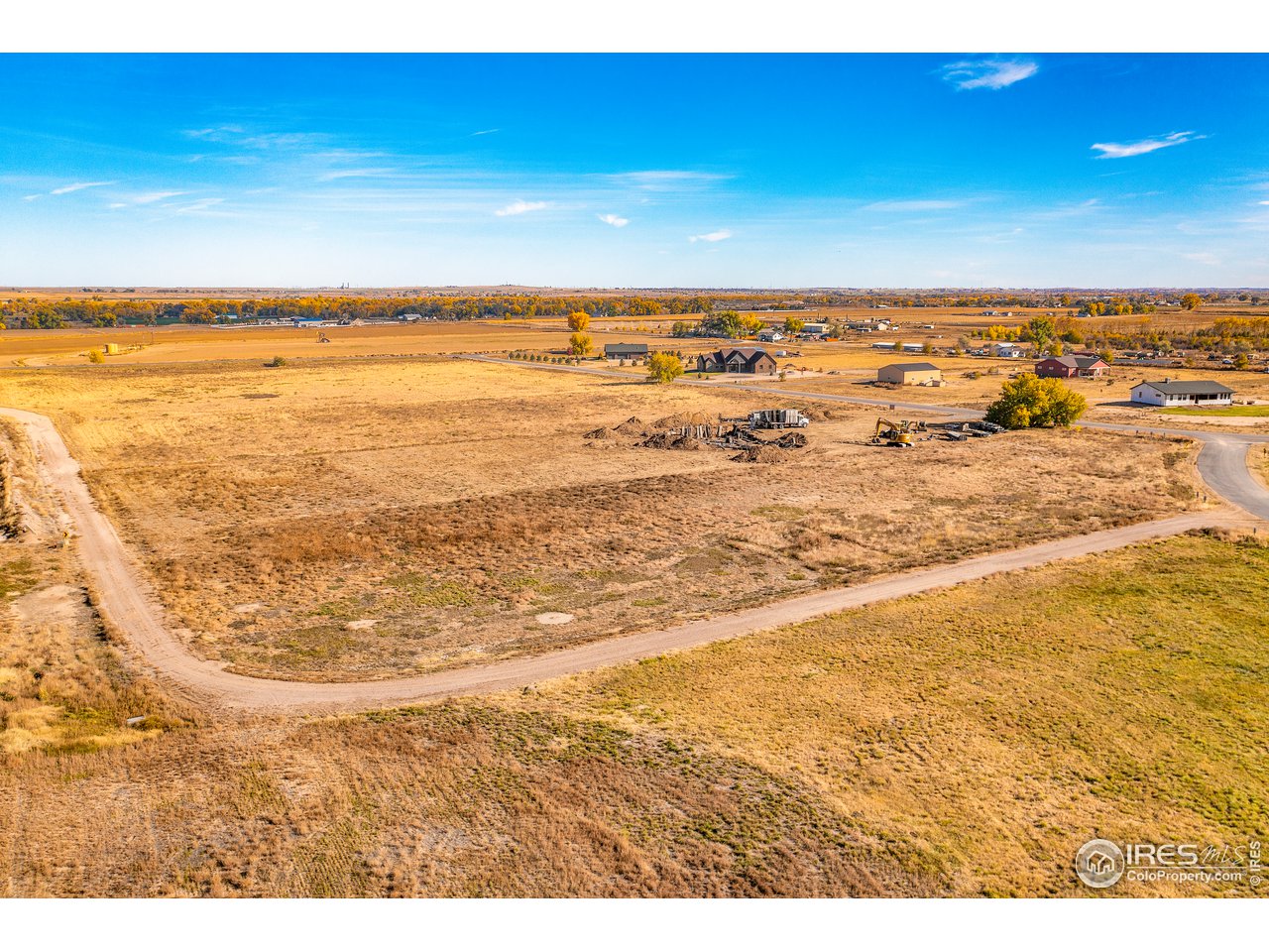 11618 Harpenden Lane Fort Lupton, CO 80621 - Photo 9 of 10 a view of an ocean and beach