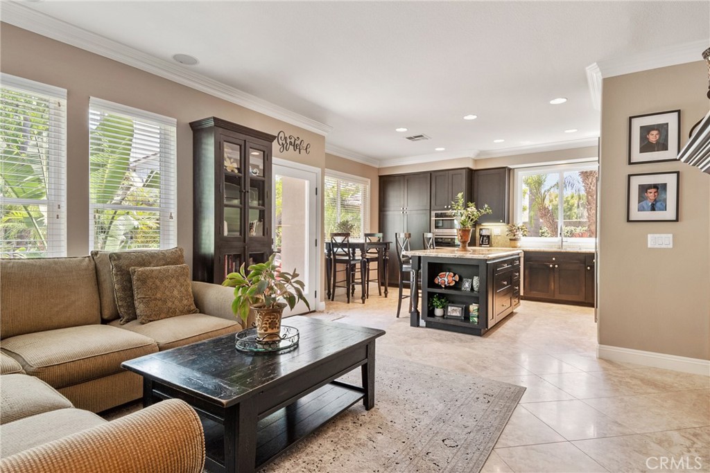 14 San Angelo Lake Forest, CA 92610 - Photo 15 of 70 a living room with furniture and large windows