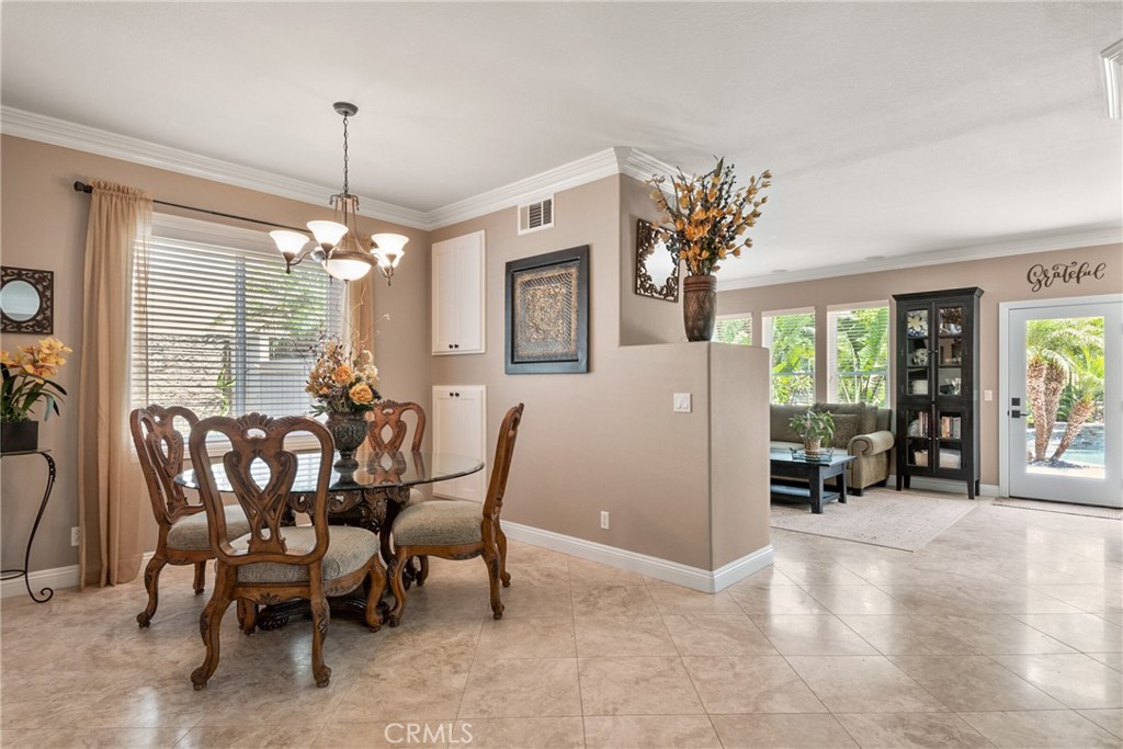 14 San Angelo Lake Forest, CA 92610 - Photo 7 of 70 a view of a dining room with furniture window and outside view
