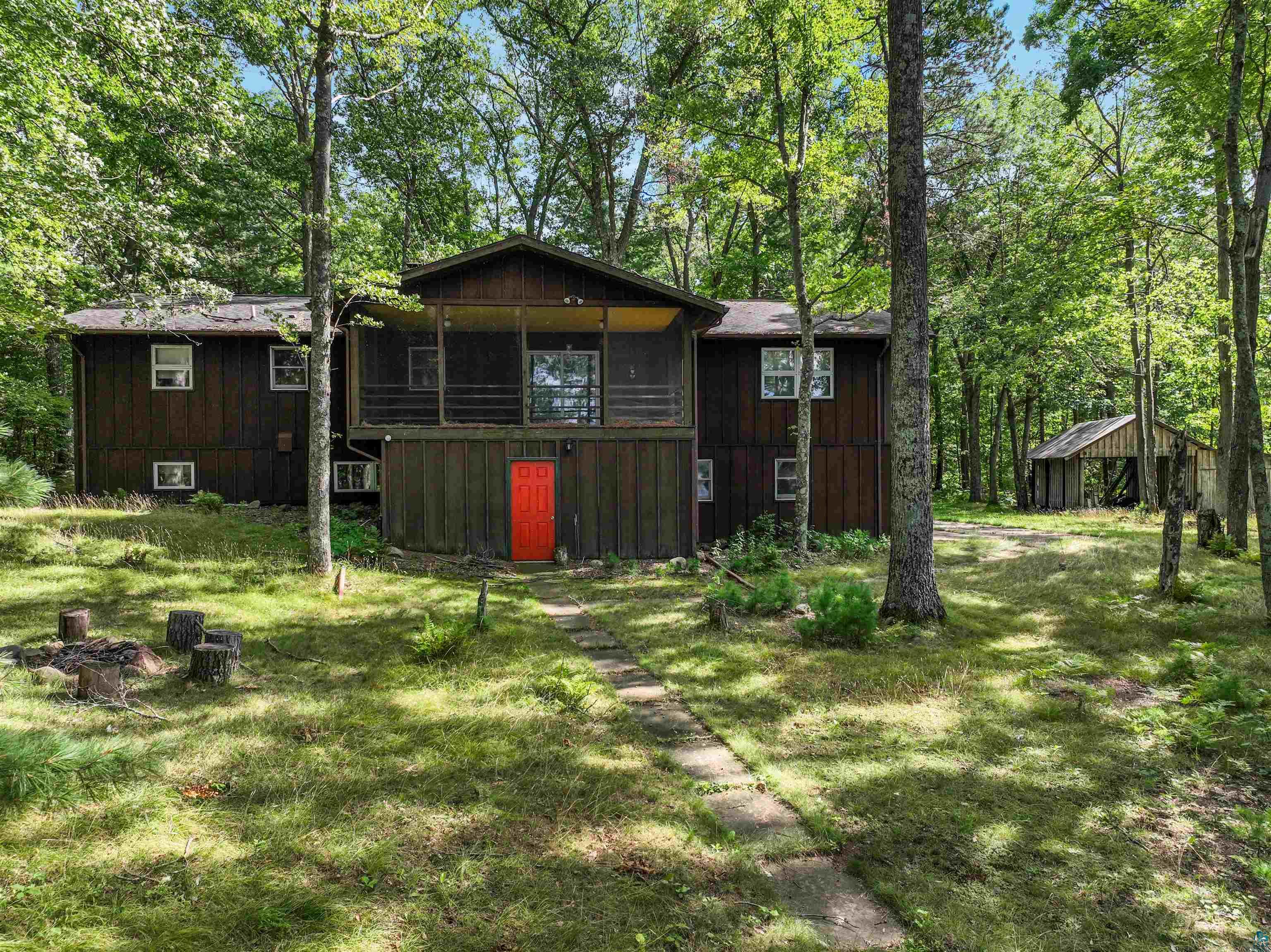 1102 Blackburn Road Spooner, WI 54801 - Photo 17 of 30 Exterior space with a lawn