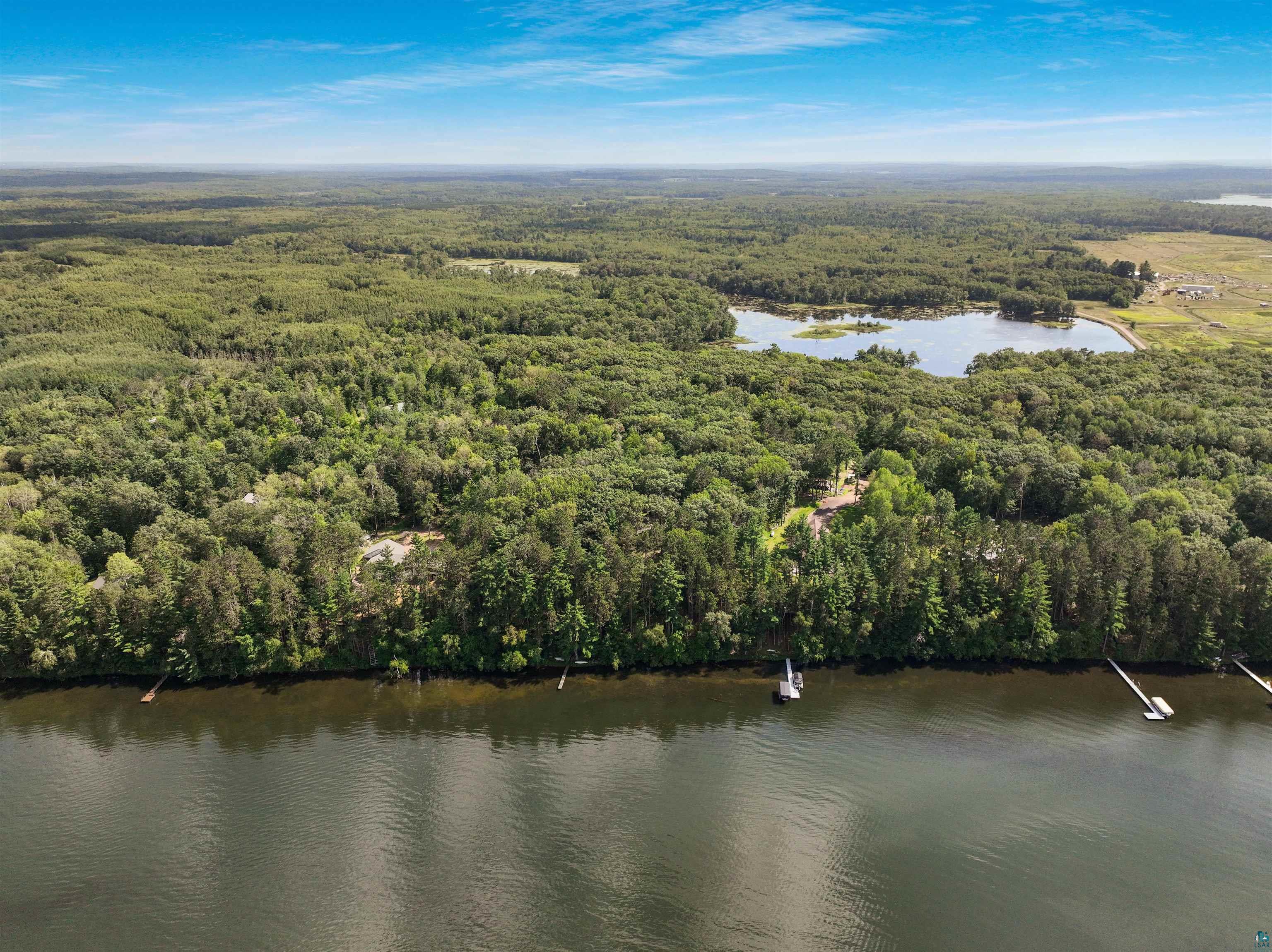 1102 Blackburn Road Spooner, WI 54801 - Photo 19 of 30 Drone / aerial view with a water view