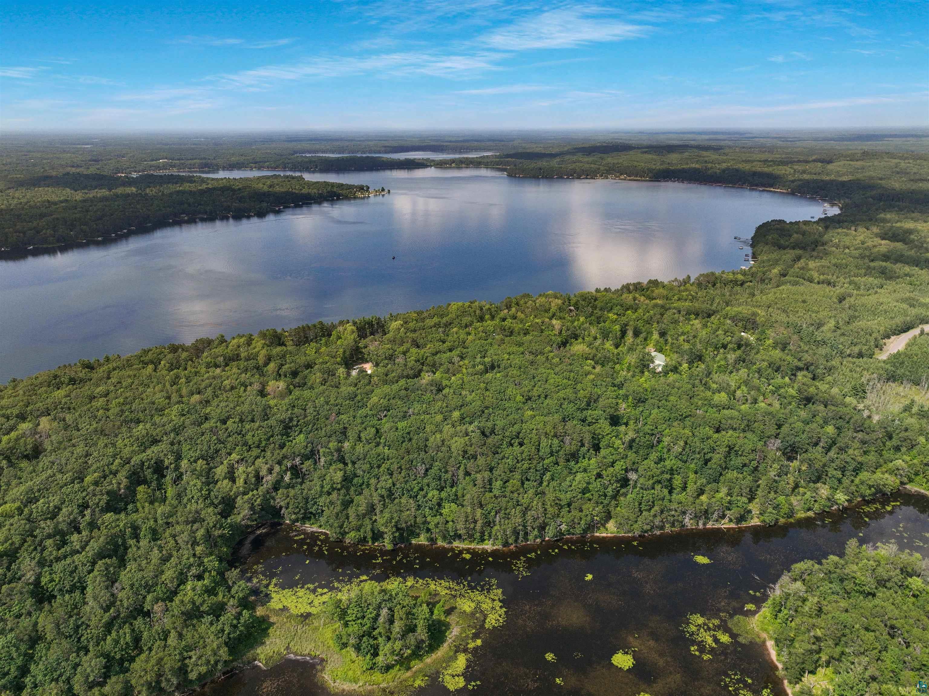 1102 Blackburn Road Spooner, WI 54801 - Photo 20 of 30 Drone / aerial view featuring a water view