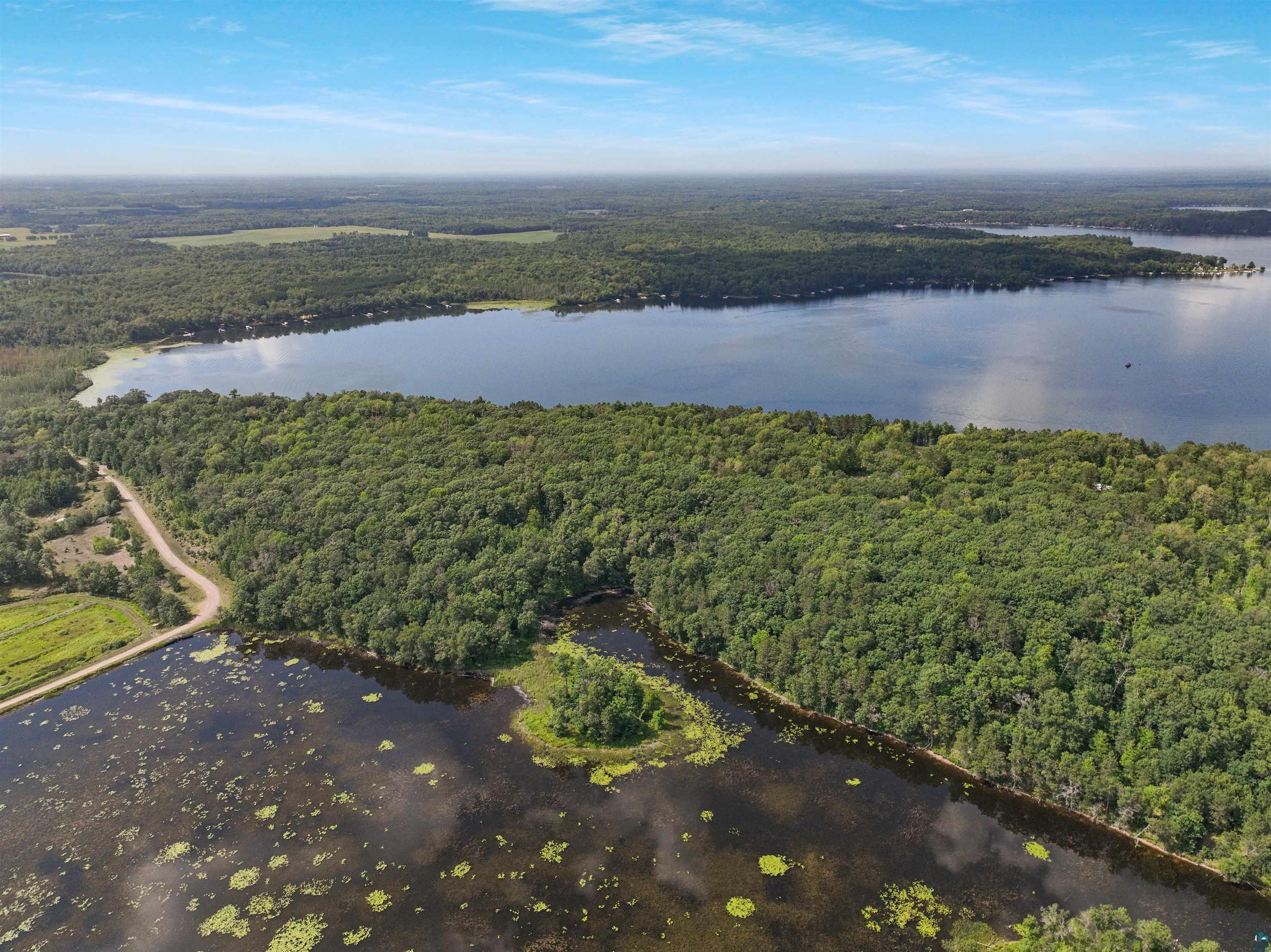 1102 Blackburn Road Spooner, WI 54801 - Photo 26 of 30 Aerial view featuring a water view
