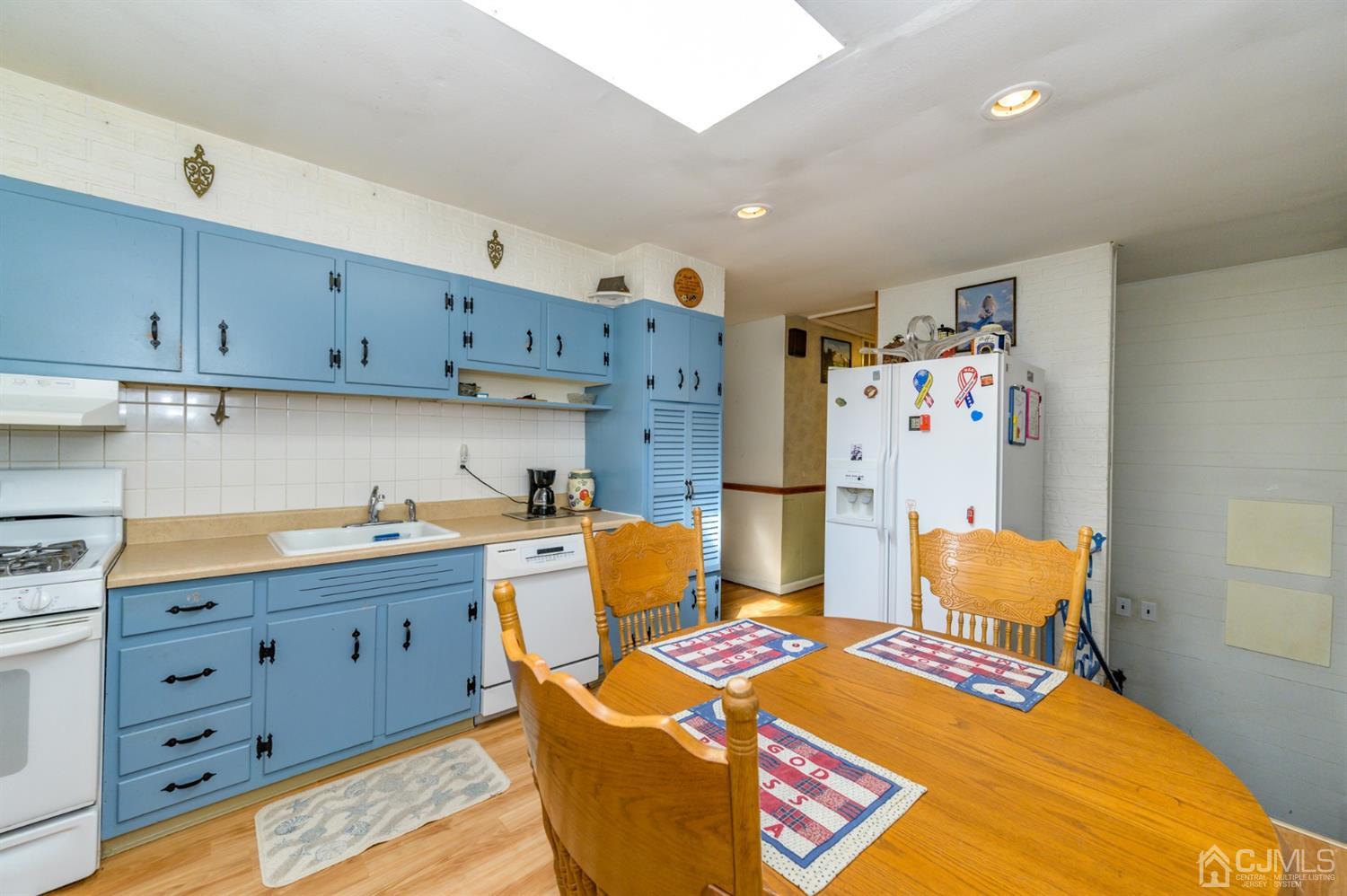 456 Dover Road Toms River, NJ 08757 - Photo 11 of 39 a bedroom with a bed and a cabinets