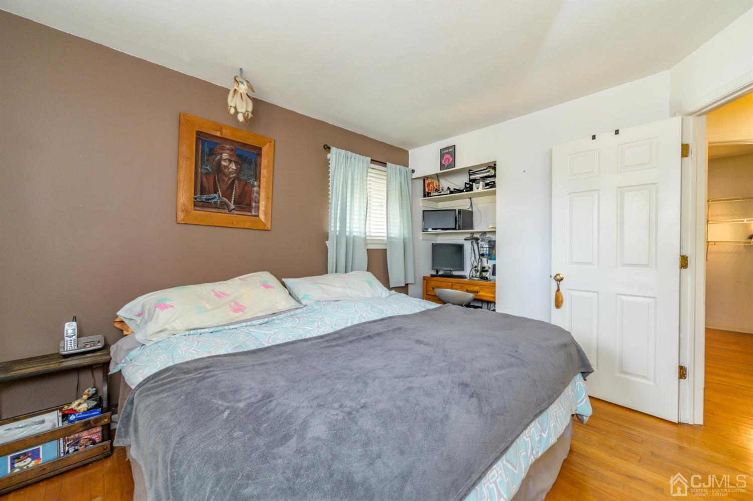 456 Dover Road Toms River, NJ 08757 - Photo 17 of 39 a bedroom with bed and window