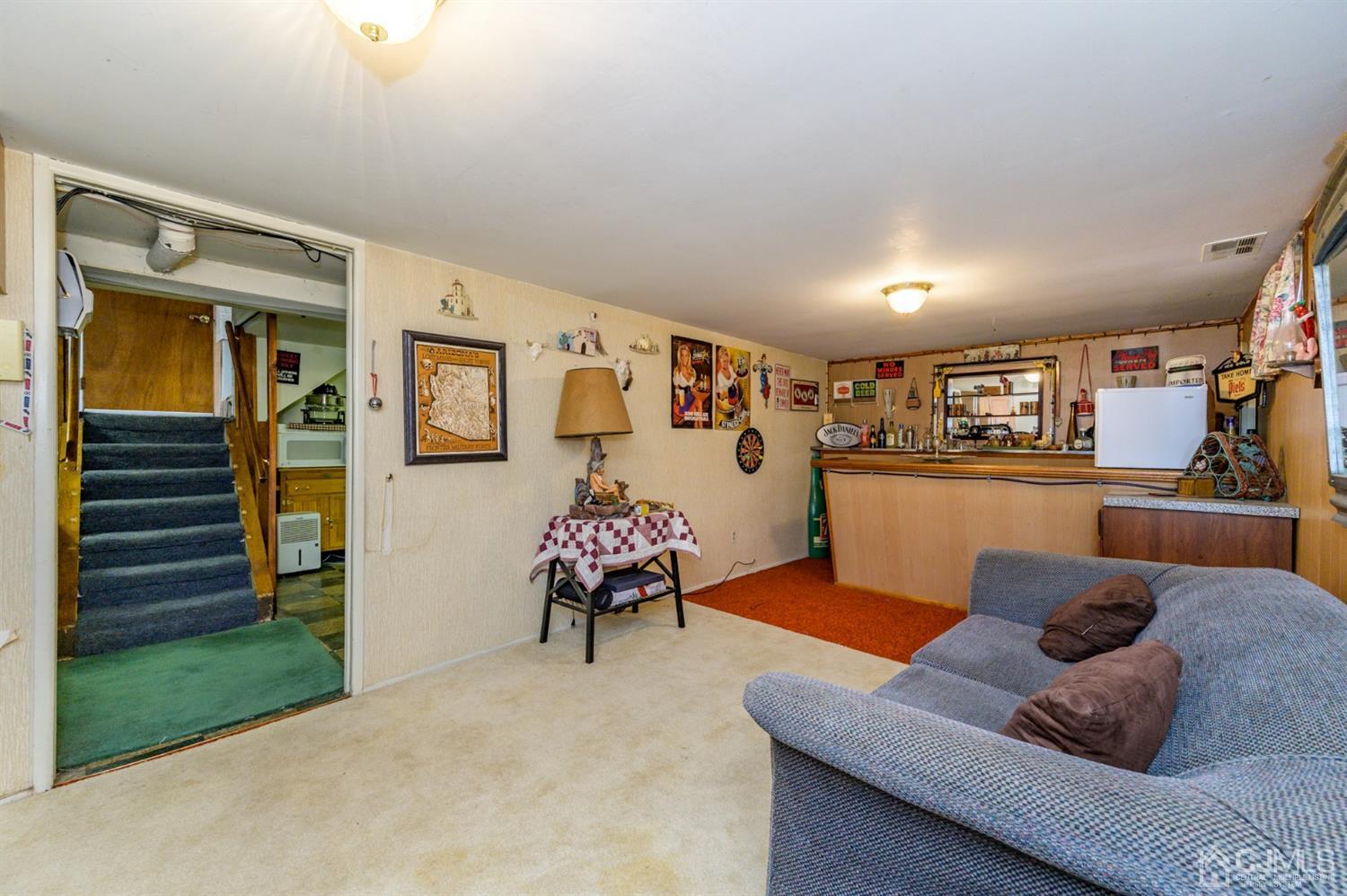 456 Dover Road Toms River, NJ 08757 - Photo 26 of 39 a living room with furniture and wooden floor