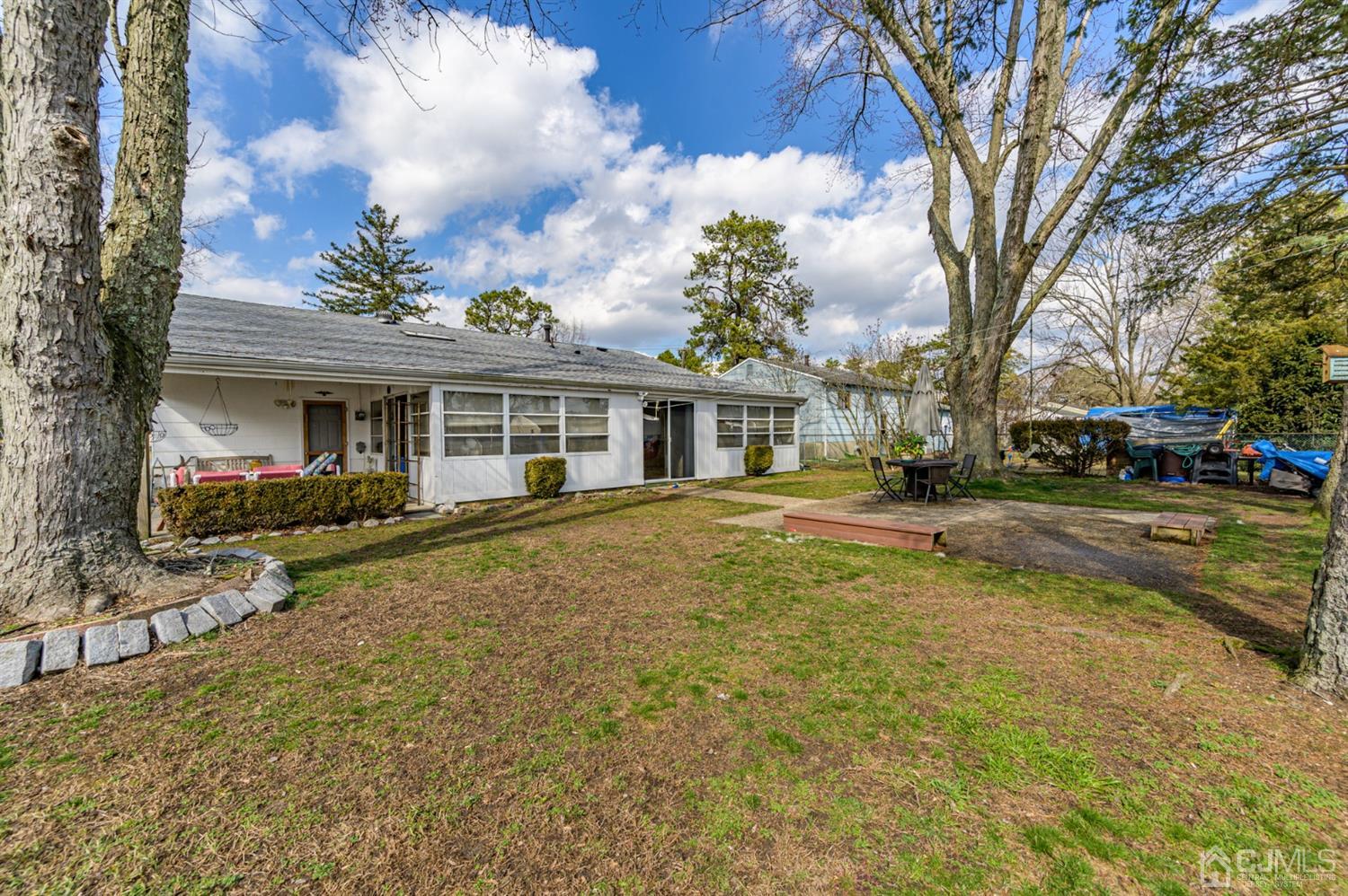 456 Dover Road Toms River, NJ 08757 - Photo 36 of 39 a front view of a house with a yard