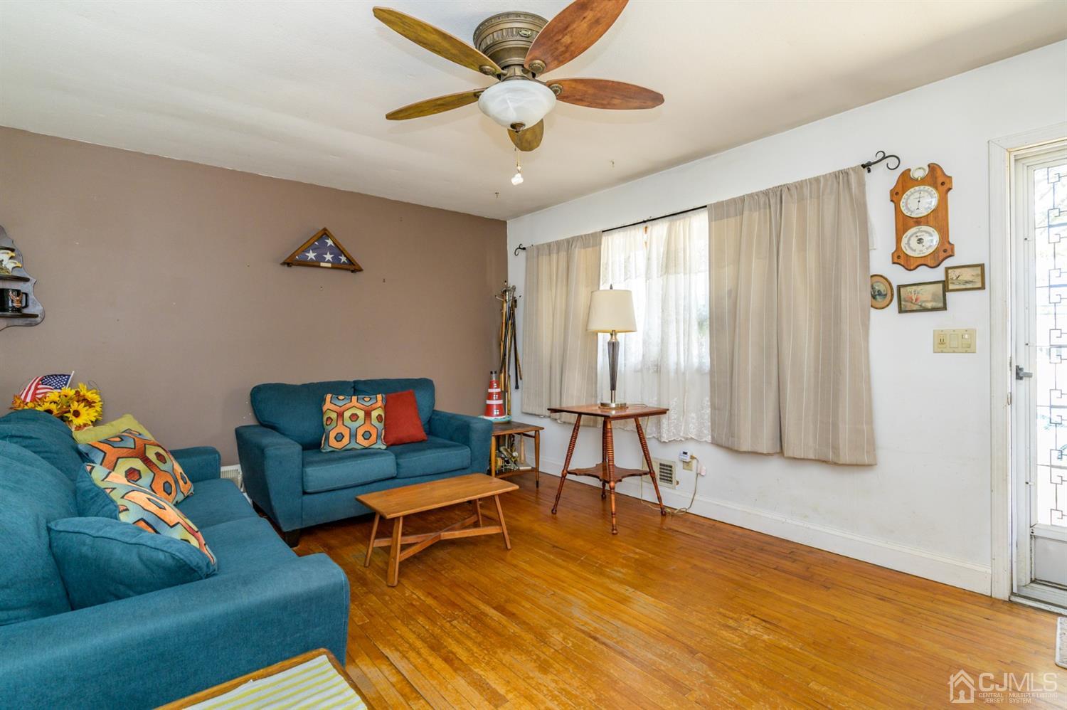 456 Dover Road Toms River, NJ 08757 - Photo 5 of 39 a living room with furniture and a window