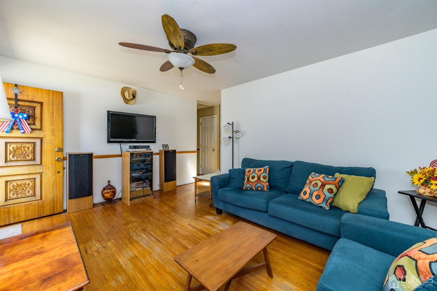 456 Dover Road Toms River, NJ 08757 - Photo 6 of 39 a living room with furniture and a flat screen tv