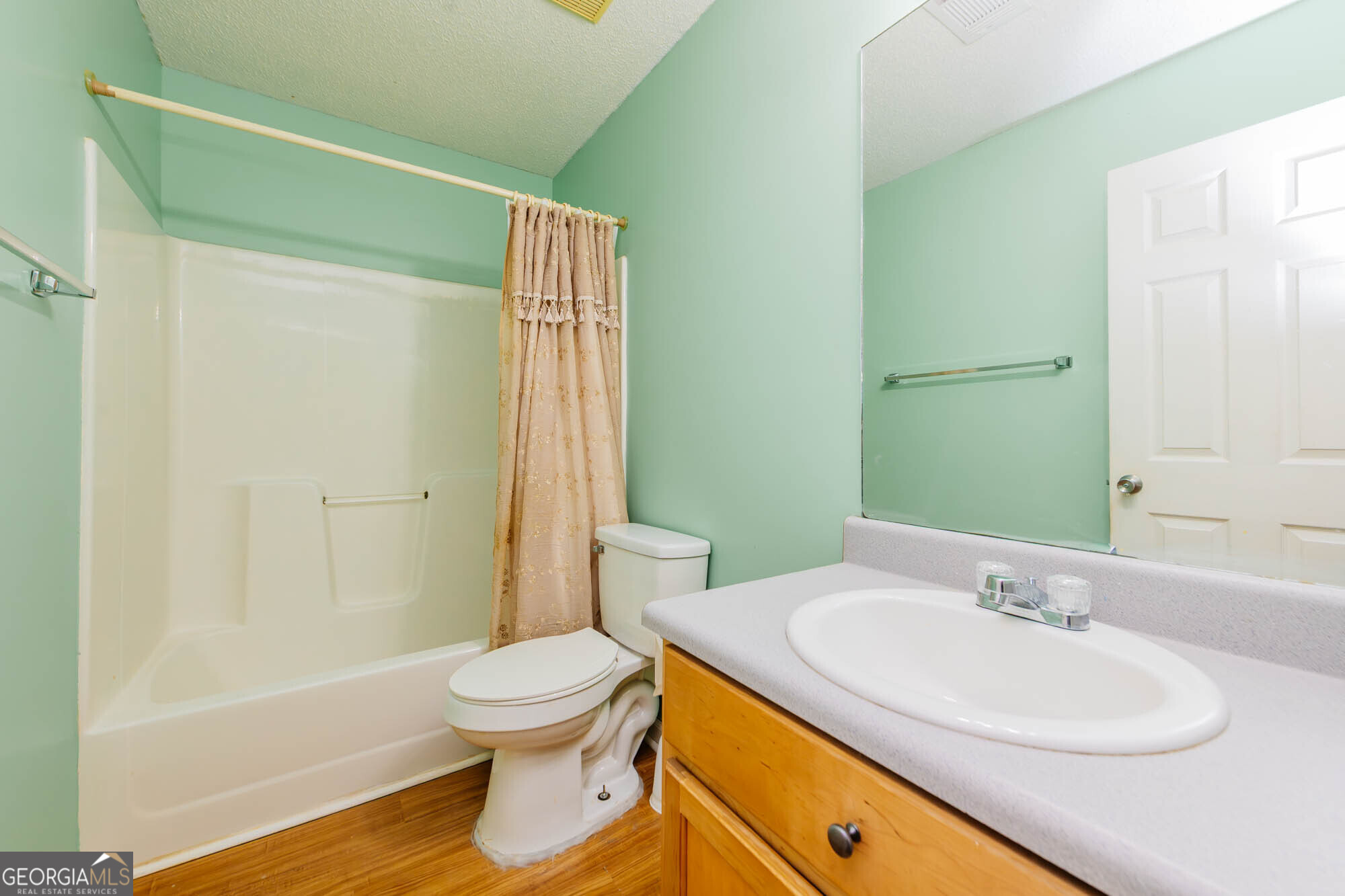 525 Hardison Church Road Byron, GA 31008 - Photo 17 of 32 a bathroom with a sink toilet and shower