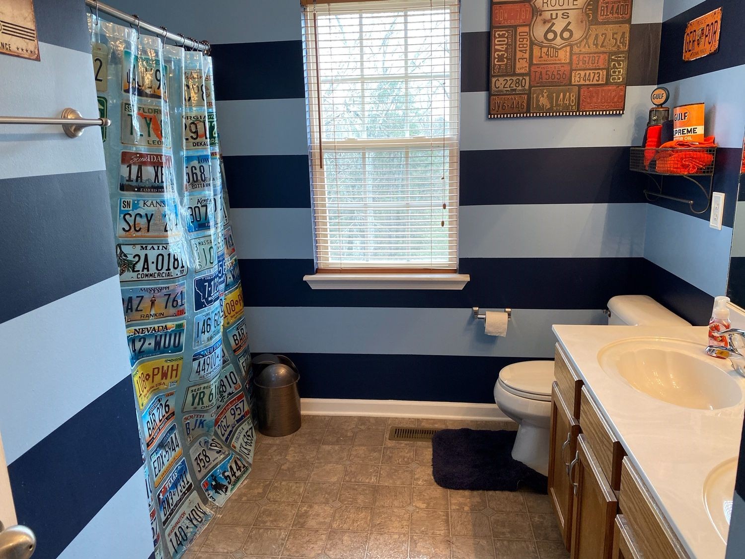 2012 McCrory Place Spring Hill, TN 37174 - Photo 13 of 18 a bathroom with a sink a toilet and a shower curtain