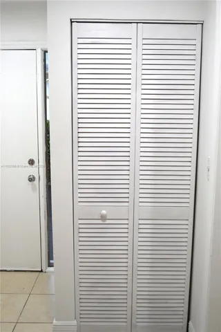 a view of a room with a window