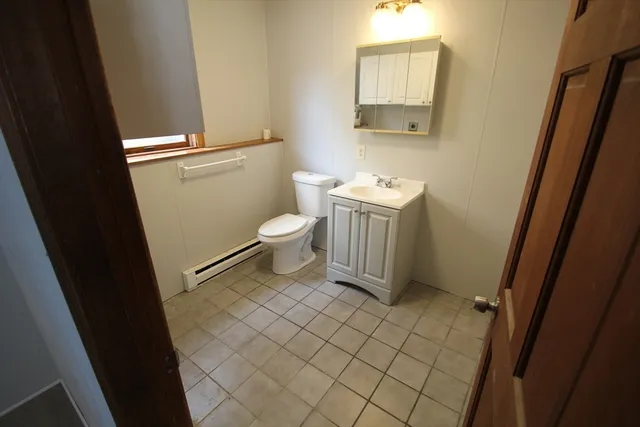 a bathroom with a sink and a toilet