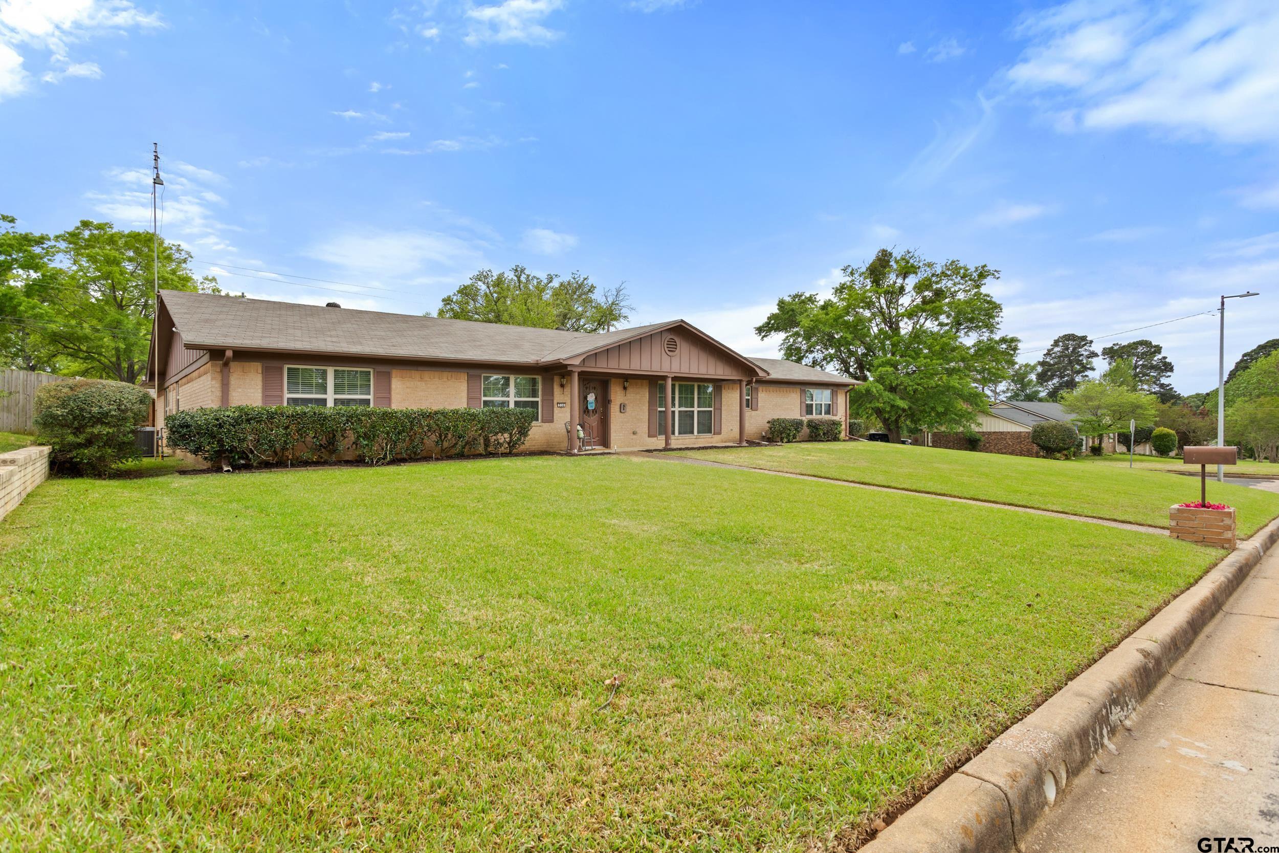 516 Ruthlynn Drive Longview, TX 75605 - Photo 34 of 34 a front view of house with yard and green space