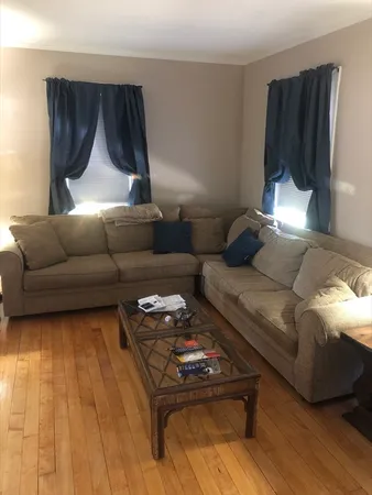 a living room with furniture and a couch