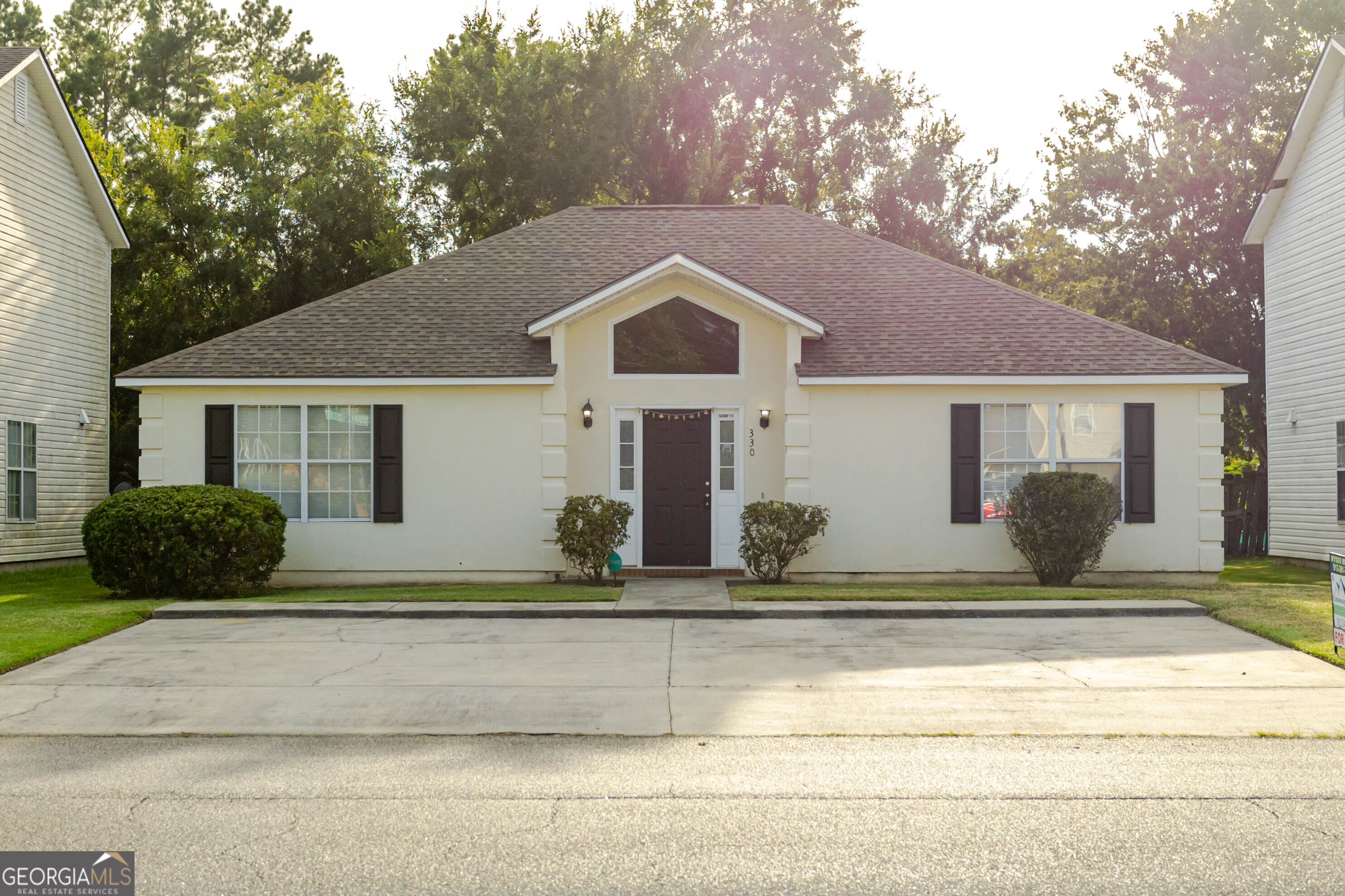 a front view of a house with entertaining space