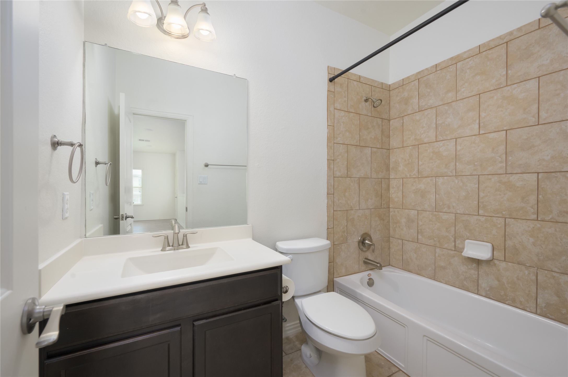 509 Nogales Lane Leander, TX 78641 - Photo 11 of 16 Full bathroom with vanity and bathing tub / shower combination