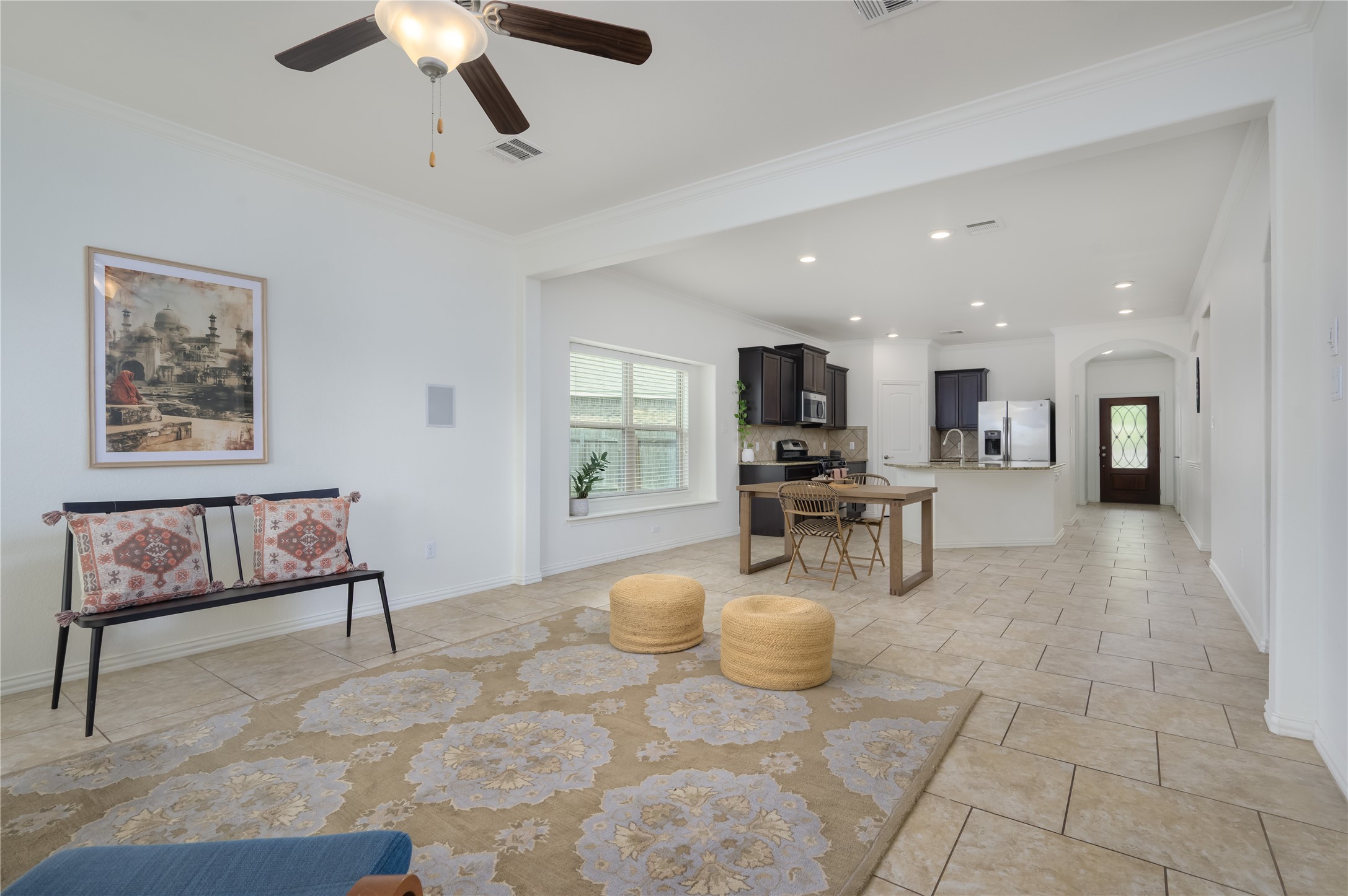 509 Nogales Lane Leander, TX 78641 - Photo 5 of 16 Large entertainment space with living room and dining room with an open concept