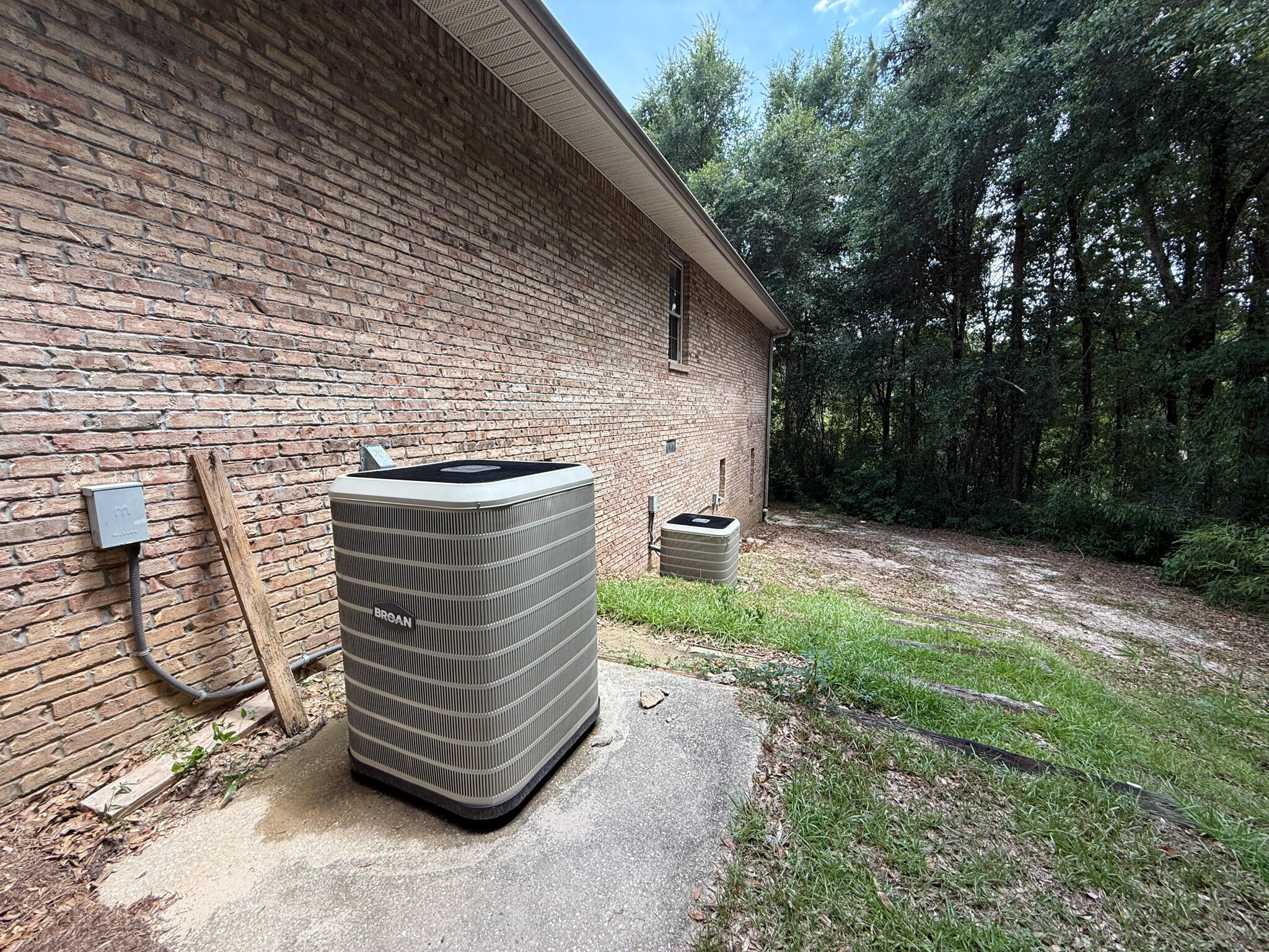 100 Overview Drive Crestview, FL 32539 - Photo 13 of 82 a view of a backyard with a sink