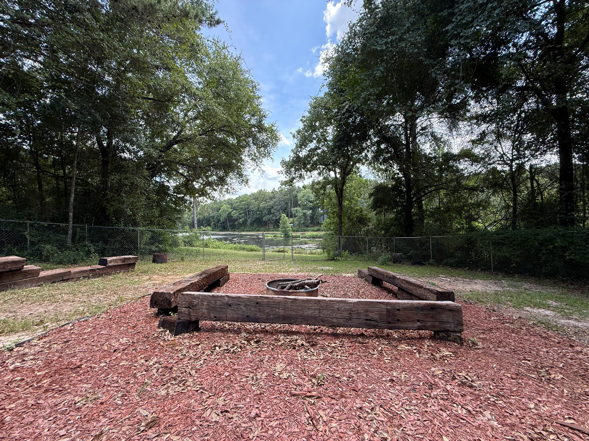 100 Overview Drive Crestview, FL 32539 - Photo 14 of 82 a backyard of a house with lots of green space