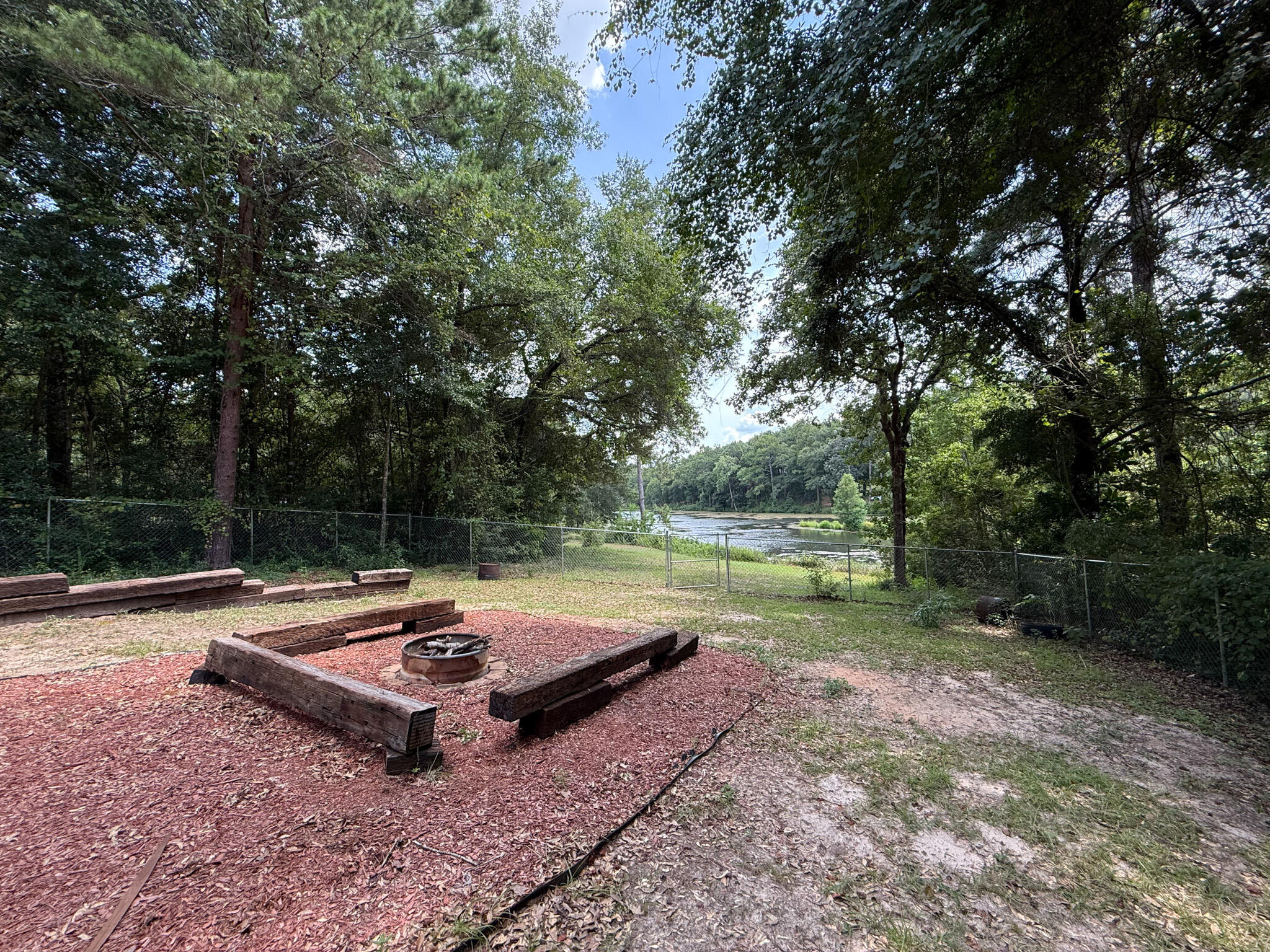 100 Overview Drive Crestview, FL 32539 - Photo 16 of 82 a view of a swimming pool and lounge chairs in the patio