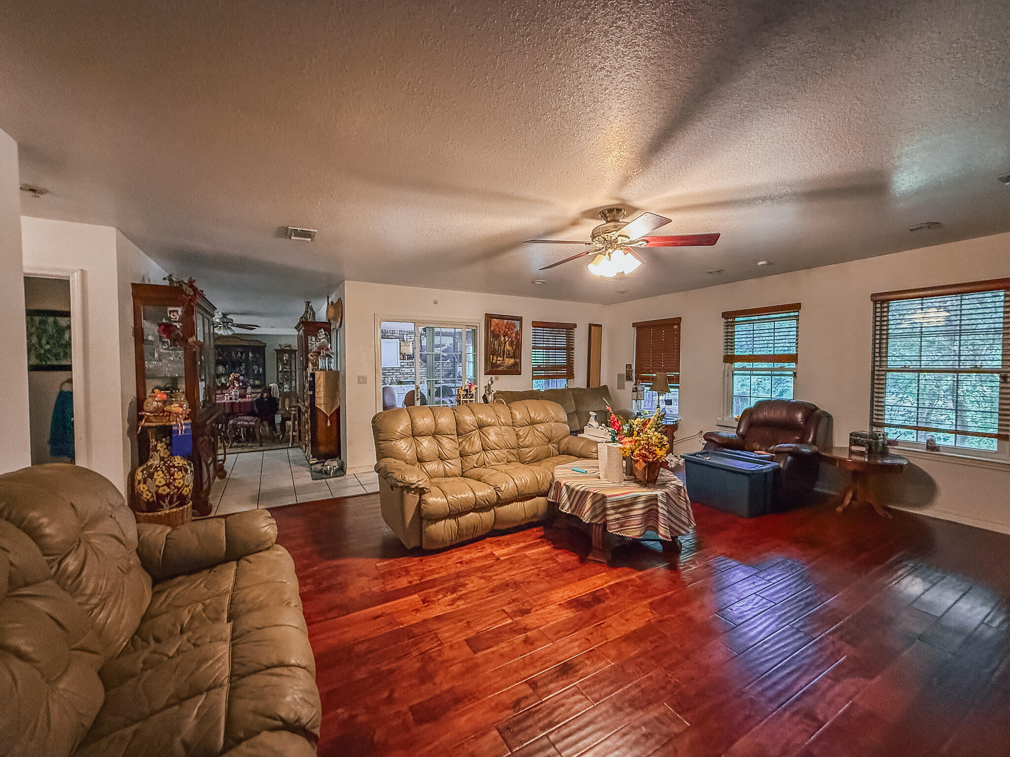 100 Overview Drive Crestview, FL 32539 - Photo 54 of 82 a living room with furniture and wooden floor