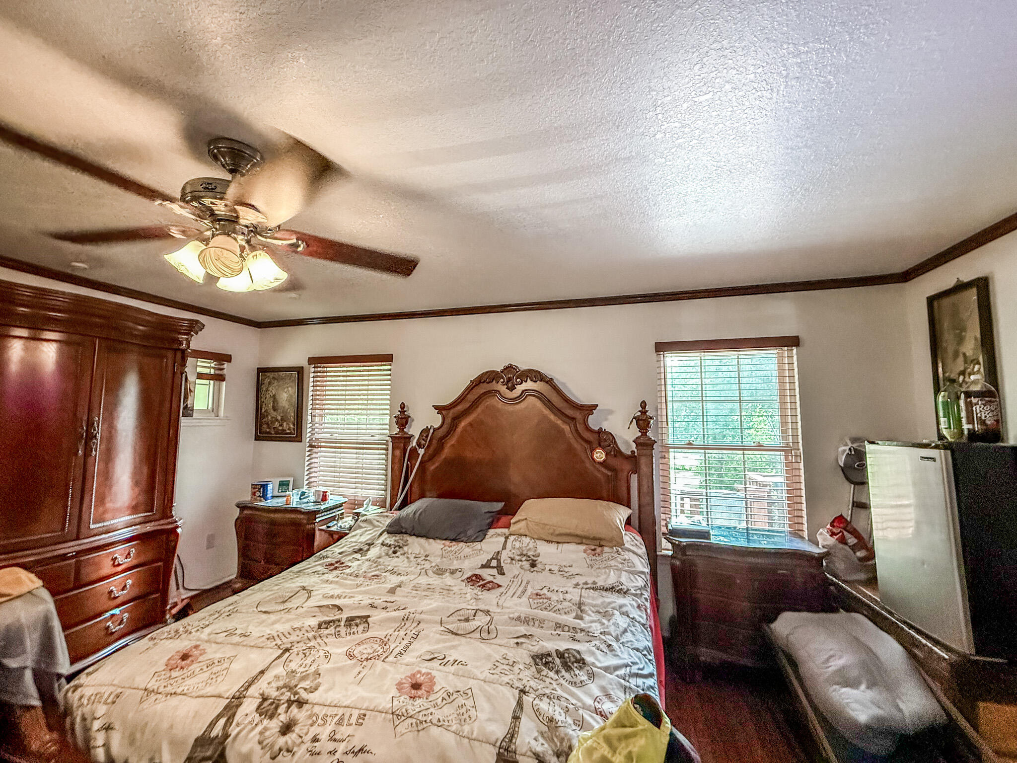 100 Overview Drive Crestview, FL 32539 - Photo 70 of 82 a bedroom with a bed furniture and a flat screen tv
