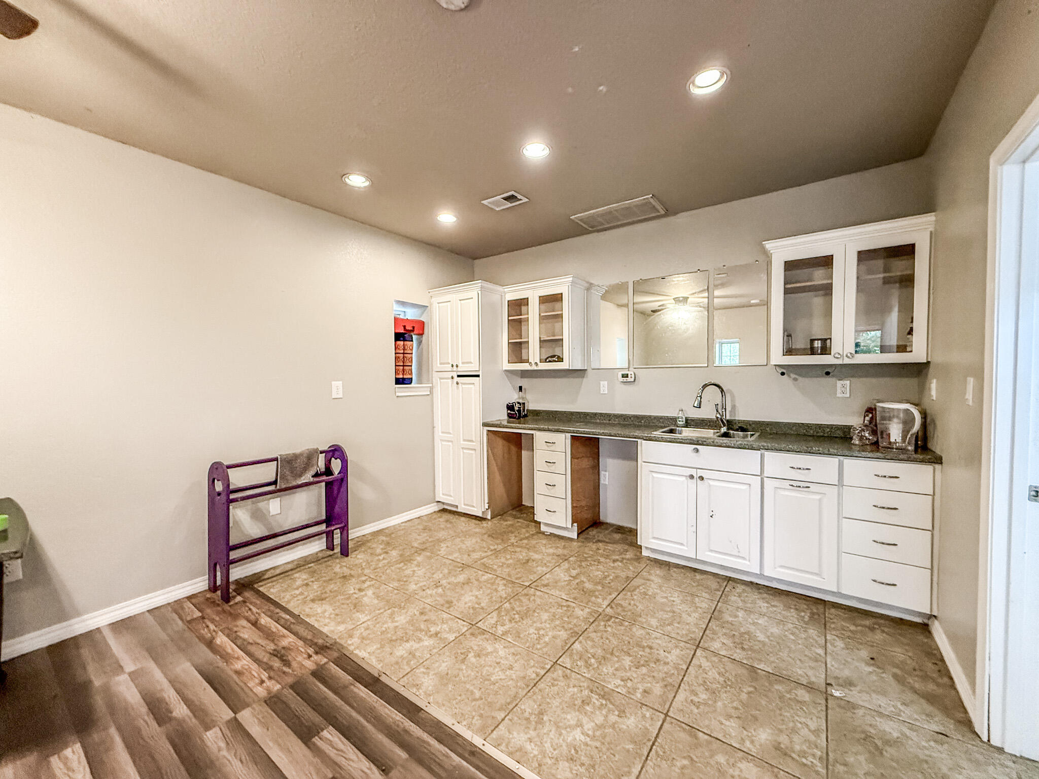 100 Overview Drive Crestview, FL 32539 - Photo 80 of 82 a kitchen with a refrigerator and cabinets