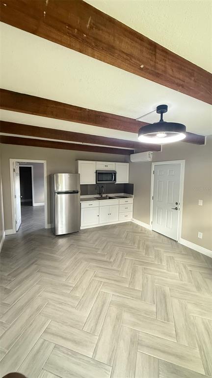 1760 Tee Dee Lane, Unit A Titusville, FL 32780 - Photo 4 of 7 a view of a garage