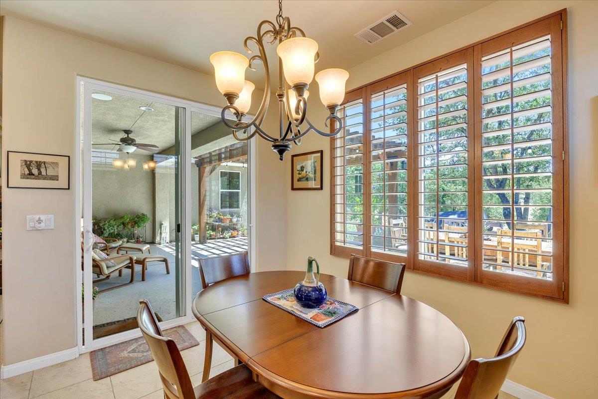 119 Hawkridge Court, Unit 460 Copperopolis, CA 95228 - Photo 41 of 71 Dining Area . Easy access to the beautiful backyard paradise.