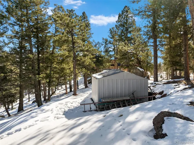a view of a backyard of a house